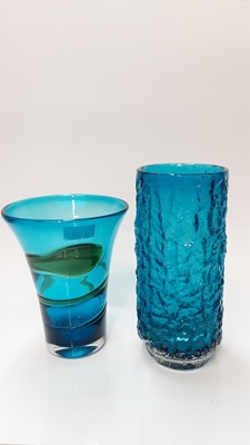 Lot 1138 - Whitefriars Kingfisher blue ribbon trailed vase, 21.5cm high, together with a Kingfisher blue bark vase (cracked) 26.5cm high (2)
