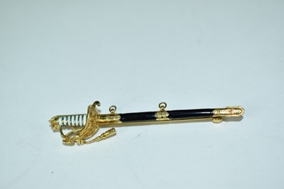 Lot 809 - Good quality 18ct gold and enamel brooch sweetheart brooch in the form of a Naval Officer's sword, 6.5cm long