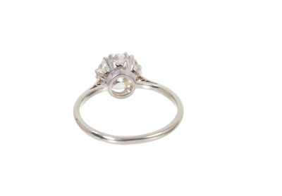 Lot 697 - Diamond single stone ring with a round brilliant cut diamond estimated to weigh approximately 1.83cts in coronet claw setting on platinum shank. Ring size N½.