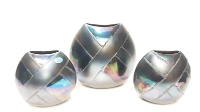Lot 1166 - Three Poole Alchemy Purse vases, 26cm high and 19cm high