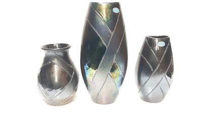 Lot 1167 - Two Poole Alchemy Manhattan vases, 37cm high and 25cm high and one other (3)