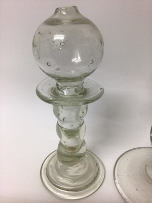 Lot 373 - Three 18th/19th century glass lacemaker's lamps, two with cut decoration