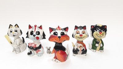 Lot 1185 - Five Lorna Bailey model cats including one with cricket bat
