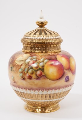 Lot 383 - A Royal Worcester pot pourri with pierced cover, hand painted with fruit and signed T. Nutt