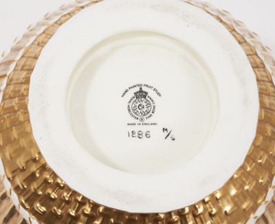 Lot 383 - A Royal Worcester pot pourri with pierced cover, hand painted with fruit and signed T. Nutt