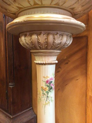 Lot 369 - An imposing Royal Worcester blush ivory jardiniere and stand, hand painted with thistles and other flowers, model number 1925
