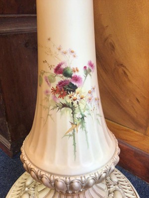 Lot 369 - An imposing Royal Worcester blush ivory jardiniere and stand, hand painted with thistles and other flowers, model number 1925
