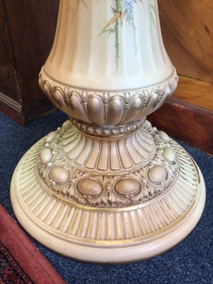 Lot 369 - An imposing Royal Worcester blush ivory jardiniere and stand, hand painted with thistles and other flowers, model number 1925