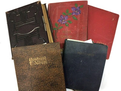 Lot 1424 - Postcards in five albums plus a large leather Victorian illustrated  photograph album. Postcards including real photographic, street scenes, children's cards, greetings, topography, artist drawn, v...