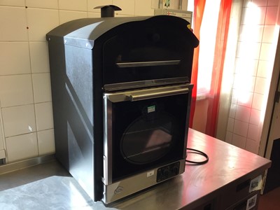 Lot 65 - A King Edward electric table top jacket potato baking oven, cable and plug