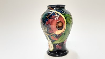 Lot 1227 - Moorcroft pottery vase decorated in the Queen's Choice pattern, dated 2000, 16cm high, boxed