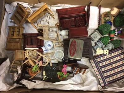 Lot 1876 - Group of dolls house furniture, including wooden and metal items, brass and ceramic dining room and garden items.