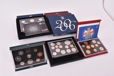 Lot 402 - G.B. - Royal Mint proof coin sets to include 1984 (blue case), 2001, 2002, 2003, 2004 (N.B. In red leather case), 2005, 2006, 2008 and 2010 (N.B. All cased with Certificates of Authenticity) (9 coi...