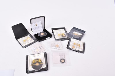Lot 444 - World - Mixed small gold coins to include three at 14ct (Total wt. 1.5 gm) two at 22ct (Total wt. 1 gm) three at 24ct (Total wt. 1.3 gm) and one at 9ct (Total wt. 1 gm) (9 coins)