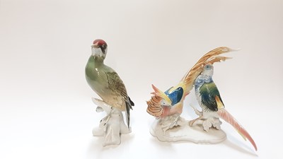 Lot 1291 - Karl Ens porcelain model of a green Woodpecker, impressed 7527, 25cm high, together with another Karl Ens porcelain Pheasant group, impressed 6857, 22.5cm high