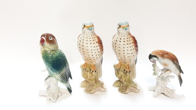 Lot 1295 - Two Karl Ens porcelain bird ornaments, 14.5cm high and 11cm high, together with two Beswick Kestrels, no 3216 (4)