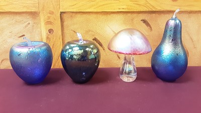 Lot 1297 - Collection of iridescent and other glass paperweights including fruit and toadstools