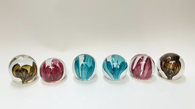 Lot 1304 - Six Strathearn Orchid (P.4) art glass paperweights, circa. 1970.