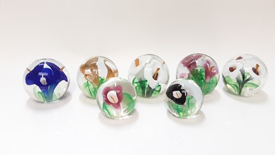 Lot 1307 - Seven Langham glass Lilys art glass paperweights