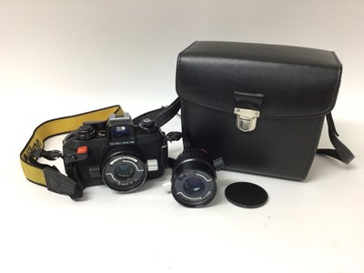 Lot 2354 - Nikon Nikonos IV-A underwater camera, with 35mm f/2.5 and 80mm f/4 lenses, strap, leather case and lens cap 
Provenance: used for forensic photography, including during the Kosovo war