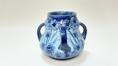 Lot 1316 - Early 20th century MacIntyre Florian Ware Moorcroft vase with four handles, printed marks and green painted signature to base, 10cm high