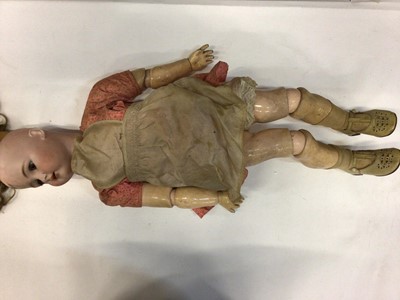 Lot 1845 - Large bisque head doll marked Simon & Halbig, K star R, 80.  Brown sleeping eyes, composite body and limbs, open mouth top four teeth showing.