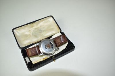 Lot 815 - Unusual Chromium plated wristwatch with engraved Nazi Swastika to cover, the underside engraved with a depiction of a V2 Rocket and the Nazi Eagle. N.B. the engraving possibly later.