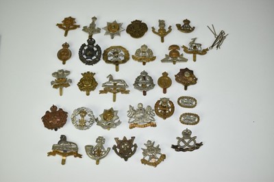Lot 722 - Collection of thirty military cap badges to include Shropshire Yeomanry, Lincolnshire Reigment and Lincolnshire Yeomanry  (30 badges)