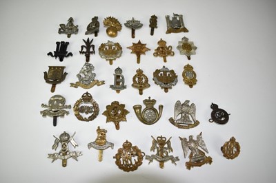 Lot 725 - Collection of thirty military cap badges to include Royal Flying Corps, Royal Scots Greys and Life Guards (30 badges)