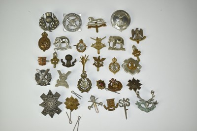 Lot 726 - Collection of thirty military cap badges to include Scottish Horse, Highland Regiment and Royal Scots Greys (30 badges)