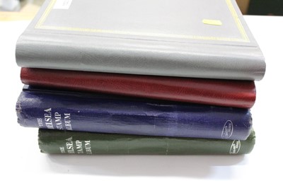 Lot 1523 - Stamps- GB and world selection in two albums, together with two albums of cigarette and trade card and bank notes including Chinese (four albums).