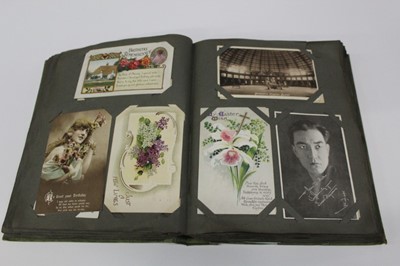 Lot 1458 - Album of antique and vintage postcards to include Japan, New Zealand, Vancouver, Military, Field Service Cards, etc. together with an album of cigarette cards (2)