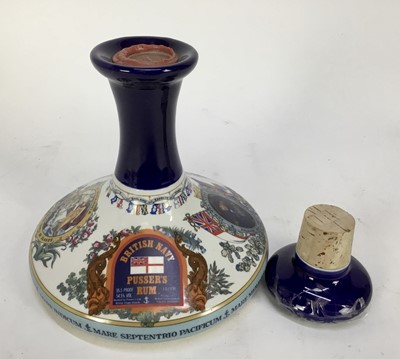 Lot 65 - Rum - one bottle, Pusser's British Navy Rum, in Wade decanter, 1 litre, 54.5% (cracked stopper)