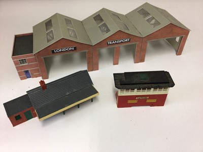 Lot 1888 - Selection of Hornby and cardboard railway buildings, bus depots and other commercial buildings (1 box)