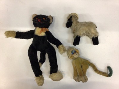Lot 1867 - Vintage Steiff toys including fox 1542/35, Steiff black cat with orange eyes and red stitched nose, blue and yellow monkey,small bear and other toys to include a  tiger..