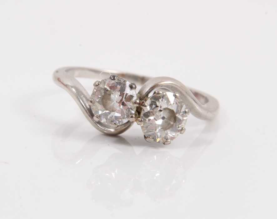 Lot 118 - Diamond two stone cross over ring