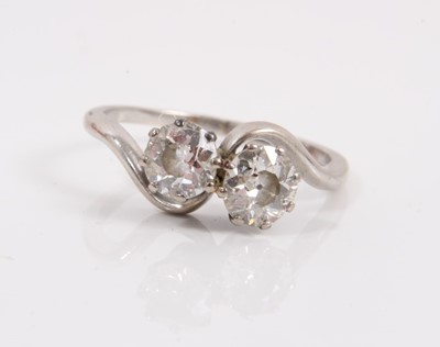 Lot 118 - Diamond two stone cross over ring