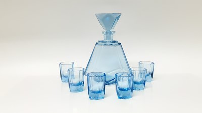 Lot 1340 - Art Deco blue tinted cut glass liqueur of geometric design set with decanter and six glasses.