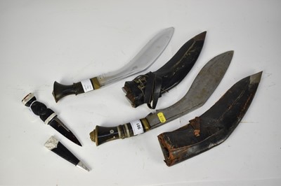 Lot 981 - Two Kukris and a dagger
