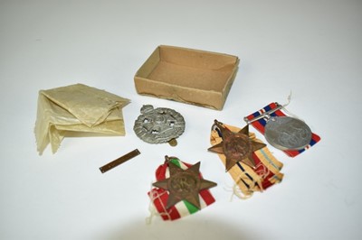 Lot 791 - Second World War medals comprising Italy Star, Africa Star with 8th Army clasp, War medal and Rifle brigade cap badge
