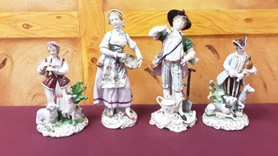 Lot 1377 - Group of porcelain and other figures, including Dresden monkey band, Sitzendorf couples, Royal Doulton Wind in the Willows group, Beswick, Guinness figures
