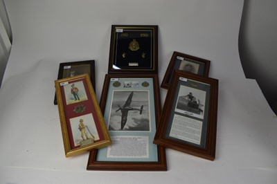 Lot 738 - Two Second World War RAF photographs signed by Johnnie Johnson, another by Arthur Charles Leigh, together with other glazed cases containing cap badges and reproduction photographs .(6)
