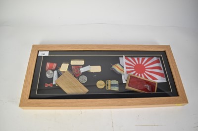 Lot 741 - Collection of Second World War Japanese medals to include China Incident War Medal and others, mounted in glazed frame.