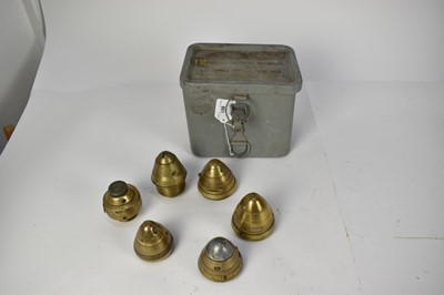 Lot 801 - Group of six First World War and later shell fuses, including one dated 1916, contained in a 1950's military issue tin.