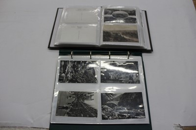 Lot 1499 - Large box of postcards in three albums and loose plus some ephemera.