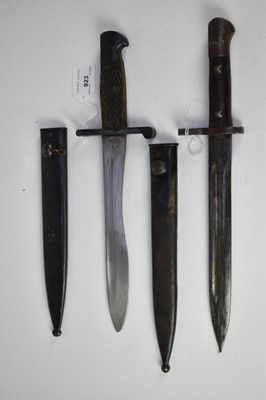 Lot 923 - Spanish Mauser Bolo knife bayonet with scabbard and Turkish Mauser bayonet with scabbard (2)