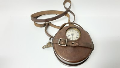 Lot 2620 - Night watchman's clock by Llewellin's Machine Co. Ltd. Bristol, in leather covered brass drum-shape case, together with a pigeon clock (2)