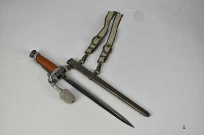 Lot 934 - Nazi Army Officers dagger by Eickhorn, Solingen with orange grip, plain blade retaining all original polish, plated mounts and scabbard with hangers and dress knot