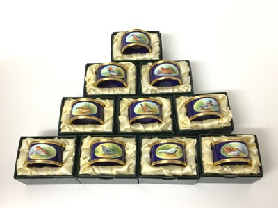 Lot 143 - Collection of ten Graham Payne Studios Worcester hand decorated napkin rings painted with British birds, together with Garrard & Co outer box, packing note and compliment slip