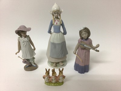 Lot 1367 - Lladro porcelain figure  - girl with lamb, together with six Nao figures another similar figure and Beswick Beatrix Potter figure - Flopsy Mopsy and Cottontail (9)